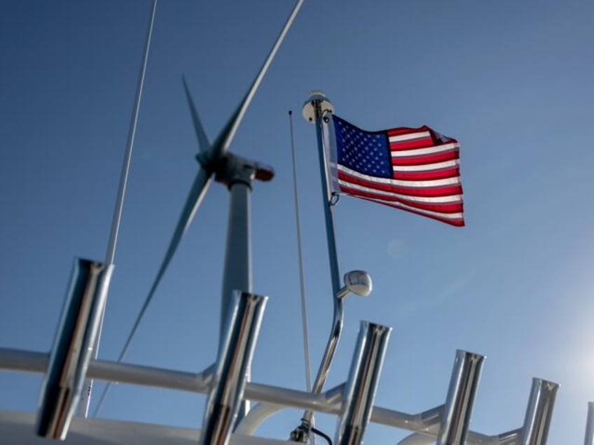 AT SEA - JULY 07: A wind turbine generates electricity at the Block Island Wind Farm on Ju