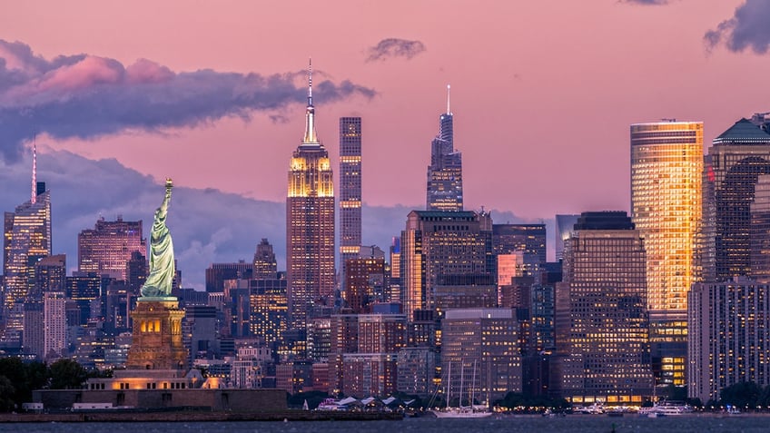 New York skyline with Statue of Liberty at left