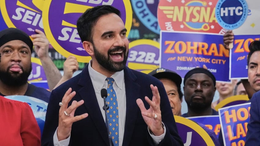 Mamdani at rally with supporters