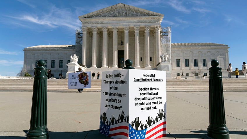 People line up outside the U.S. Supreme court building