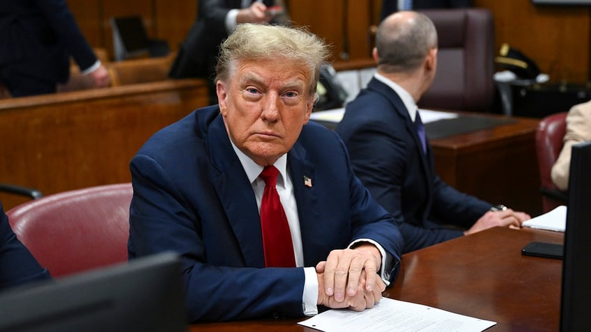 Former President Donald Trump attends the first day of his trial at Manhattan Criminal Court in New York