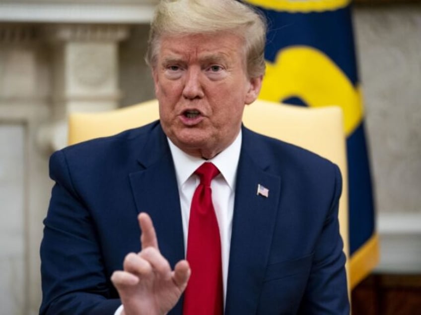 U.S. President Donald Trump speaks during a meeting with Greg Abbott, governor of Texas, n