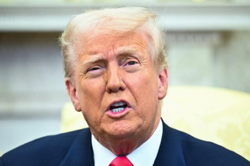 US President Donald Trump speaks to reporters as he meets with Irish Prime Minister Michea