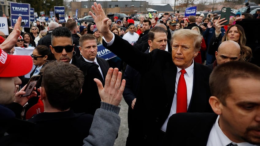 Trump waving to fans in New Hampshire