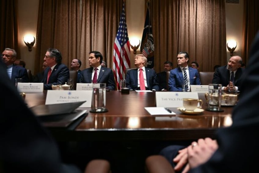 US President Donald Trump listens during a cabinet meeting at the White House