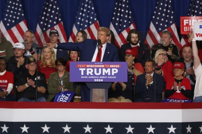 Former US President and 2024 presidential hopeful Donald Trump speaks during a campaign ra