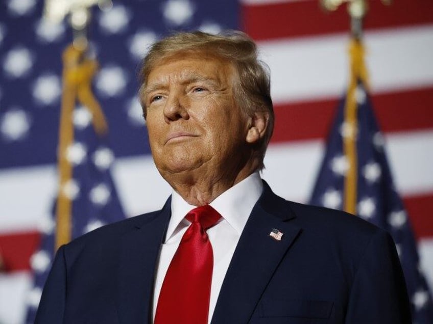 Former President Donald Trump speaks at his caucus night event at the Iowa Events Center o