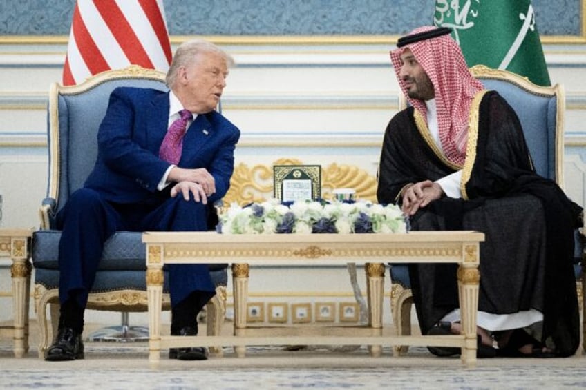 US President Donald Trump and the kingdom's Crown Prince Mohammed Bin Salman talk before a