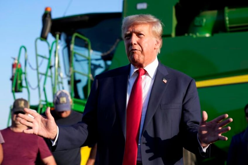 trump sets his sights on iowa with visits saturday as he tries to solidify his support in the state