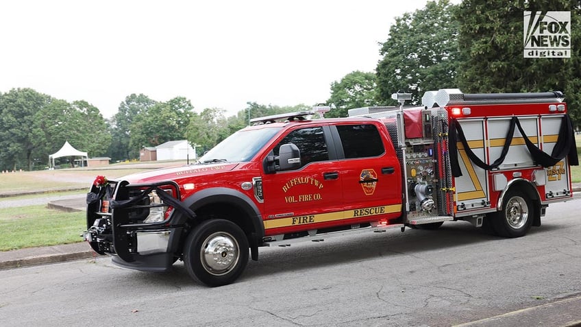 Fire truck draped in black cloth