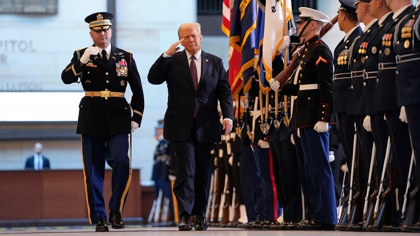 Donald Trump reviews the troops during his Inauguration ceremony