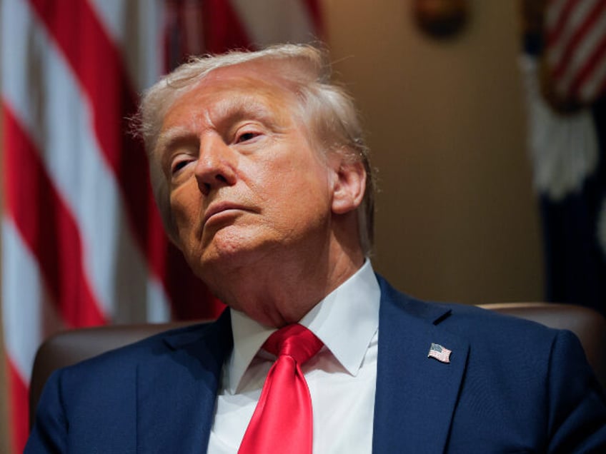 President Donald Trump listens during a Cabinet meeting at the White House in Washington,