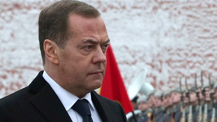 Russia's Dmitry Medvedev takes part in a wreath-laying ceremony marking Defender of the Fatherland Day at the Tomb of the Unknown Soldier by the Kremlin Wall in Moscow, Russia, February 23, 2024. 