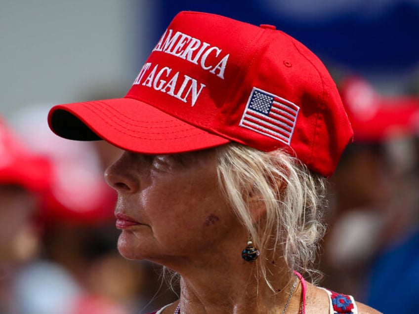 SARASOTA, FL - JULY 03: A woman wears a "Make America Great Again" hat during a