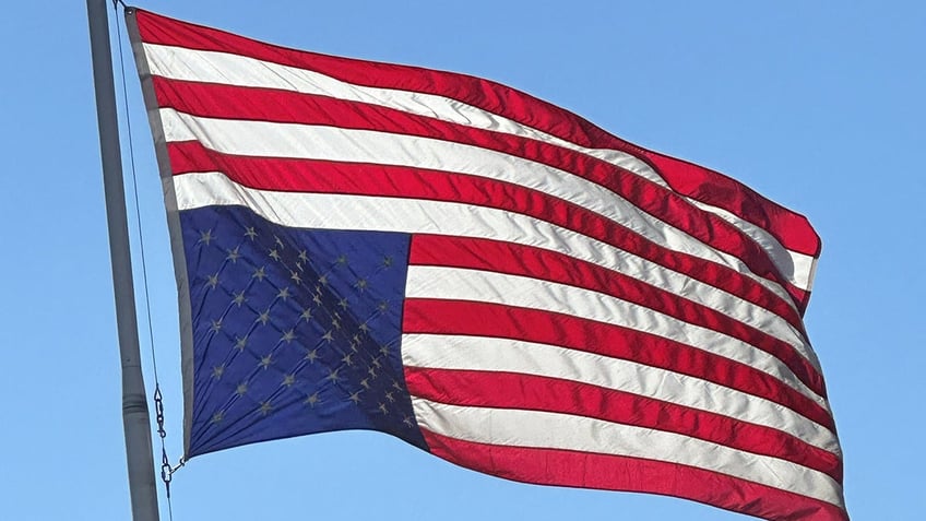 Upside down American flag at Don Tapia home