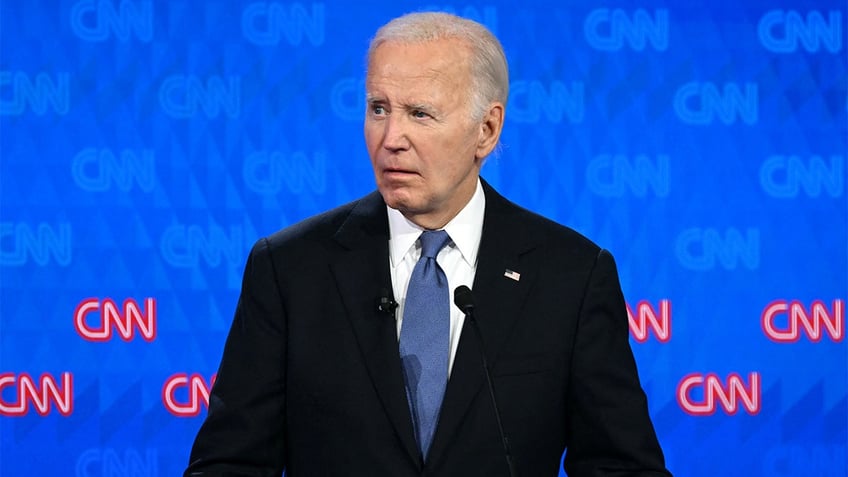 President Joe Biden looks on as he participates in the first presidential debate of the 2024 elections with former US President and Republican presidential candidate Donald Trump.