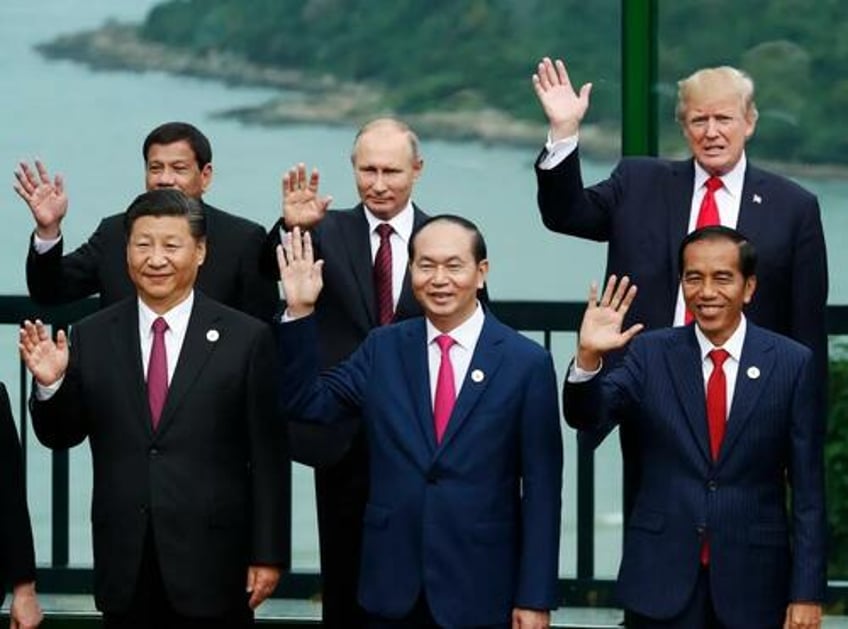 trump tells xi putin lets cut military budget in half says russia should be back in g7