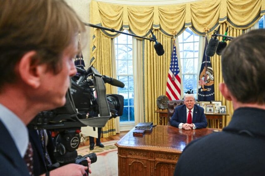 US President Donald Trump speaks to the press before signing an executive order in the Ova