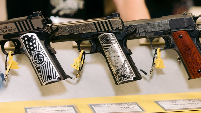 handgun with Trump's face on grip on display