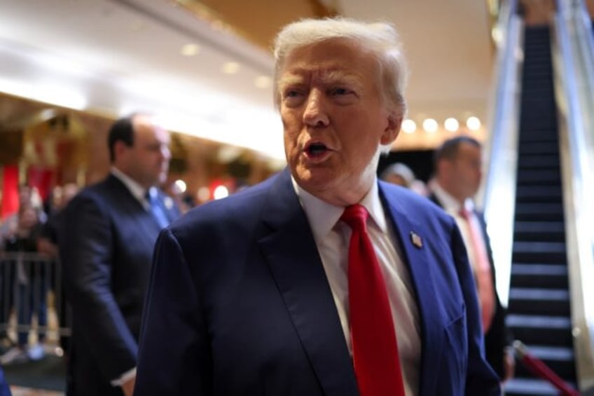 Former US president Donald Trump leaves after addressing a press conference at Trump Tower