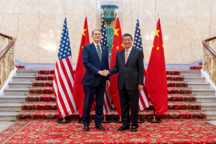 US Secretary of Treasury Scott Bessent (L) and Chinese Vice Premier He Lifeng led their re