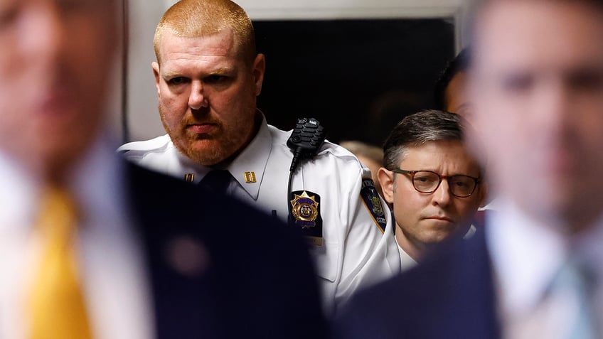 Speaker Johnson in courthouse with Trump