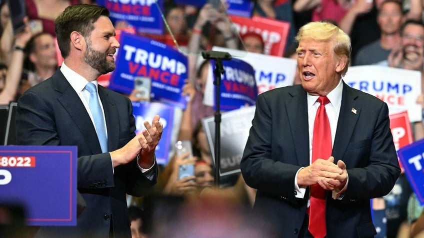 Trump and Vance clapping