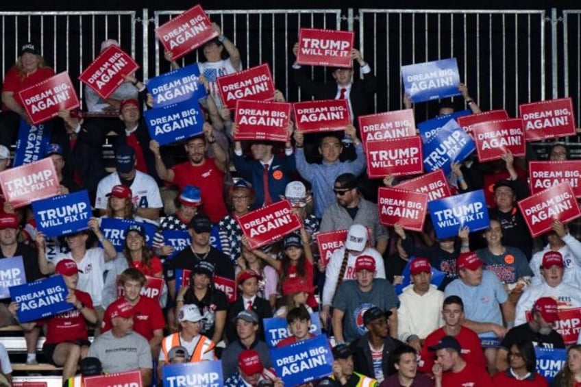 Supporters of former president Donald Trump gather at the civic center in Salem, Virginia,