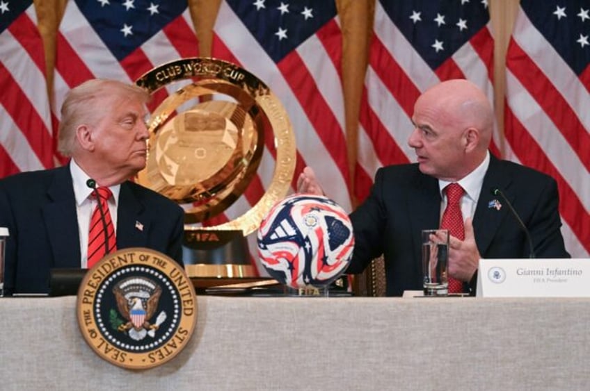 FIFA President Gianni Infantino speaks during a meeting with US President Donald Trump's W