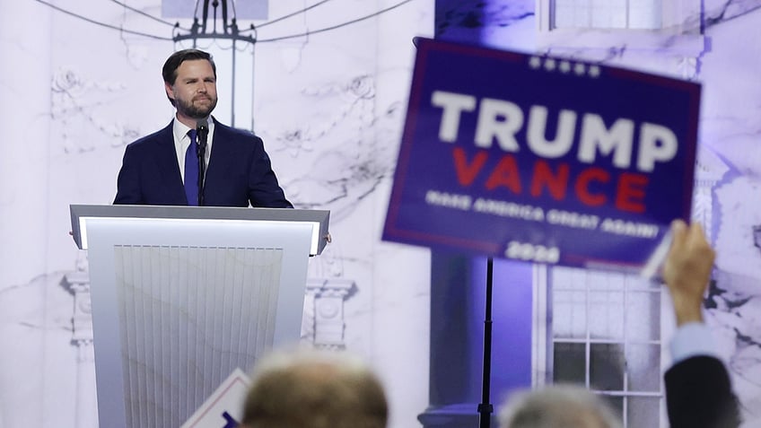 JD Vance speaking from podium at GOP convention