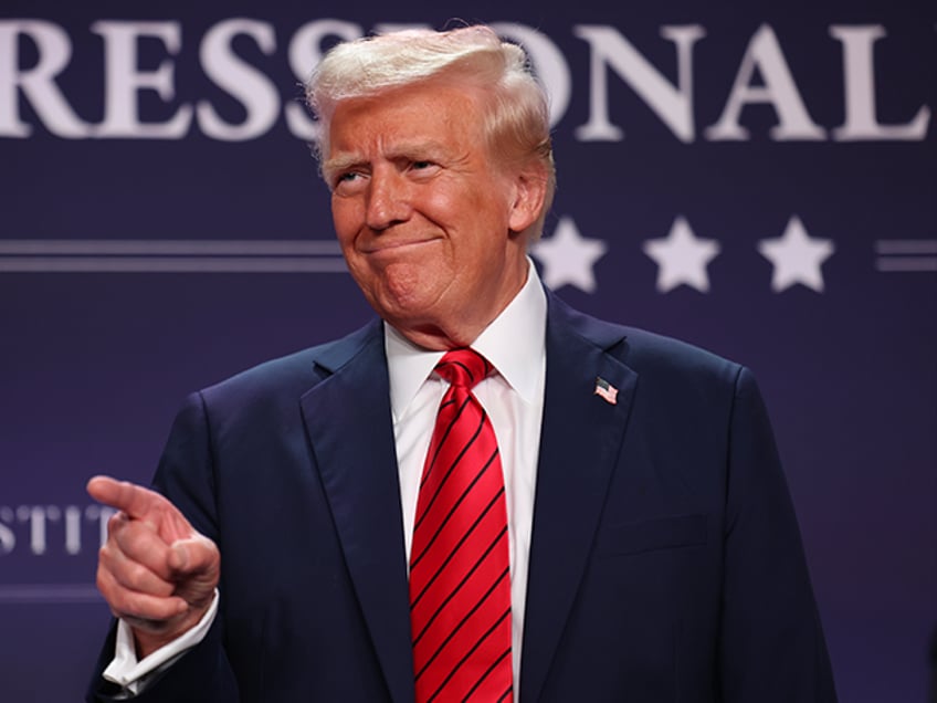 DORAL, FLORIDA - JANUARY 27: U.S. President Donald Trump acknowledges the crowd before add