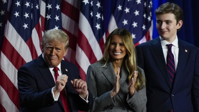 Trump, Melania and Barron on stage at Mar-a-Lago