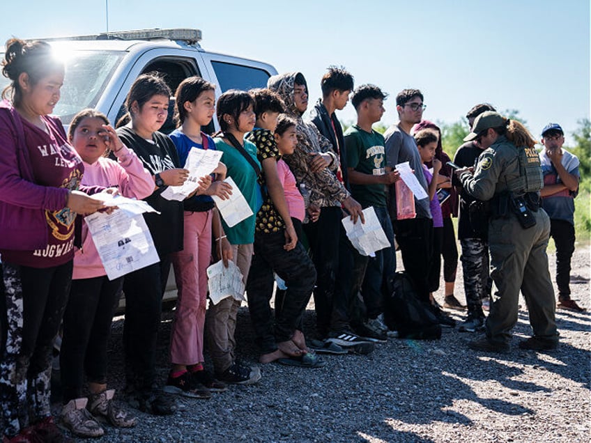 Eagle Pass, TX - September 28 : Migrants are detained by U.S. Border Patrol moments after