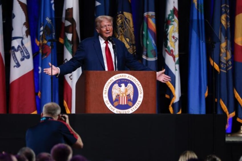 Former US President and Republican presidential candidate Donald Trump gives remarks at th