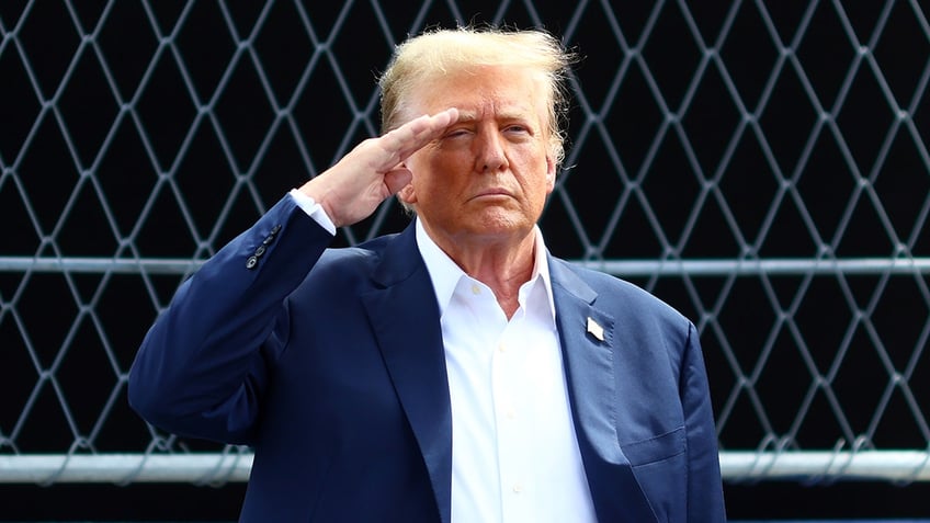 Trump saluting