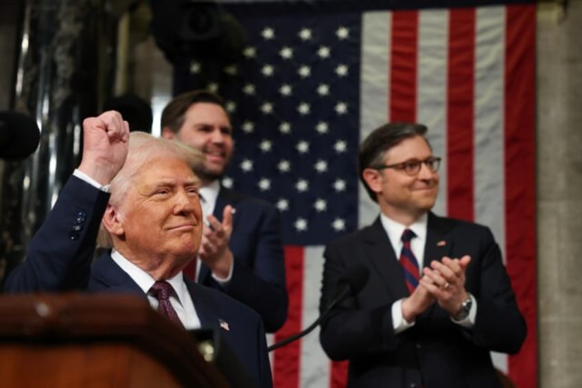 US Speaker of the House Mike Johnson (right) said US President Donald Trump (left) had per