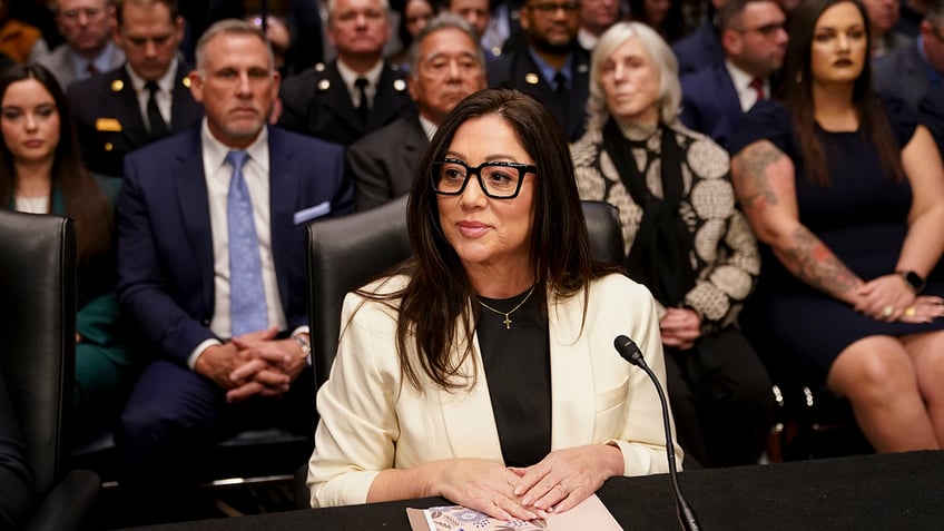 Former Rep. Lori Chavez-DeRemer, the Labor secretary nominee for President Donald Trump, center, looks on during a Senate Health, Education, Labor, and Pensions Committee confirmation hearing in Washington, D.C., on Wednesday, Feb. 19, 2025.