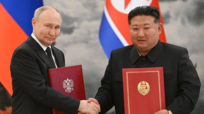 North Korean leader Kim Jong Un, right, and Russian President Vladimir Putin