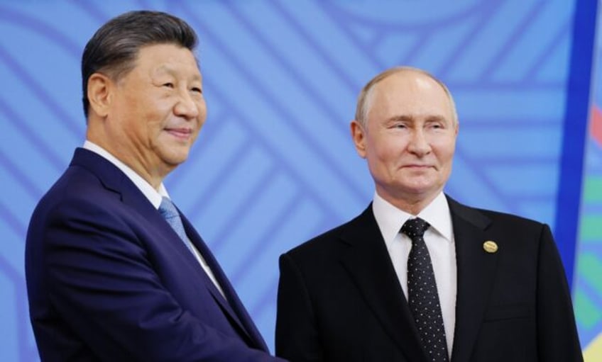 China drew Russia deeper into its orbit as Moscow faced international isolation over the U