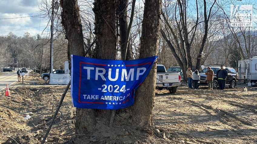 A Trump flag posted to a tree in Helene-devastated Swannanoa, North Carolina, on Jan. 24, 2025.