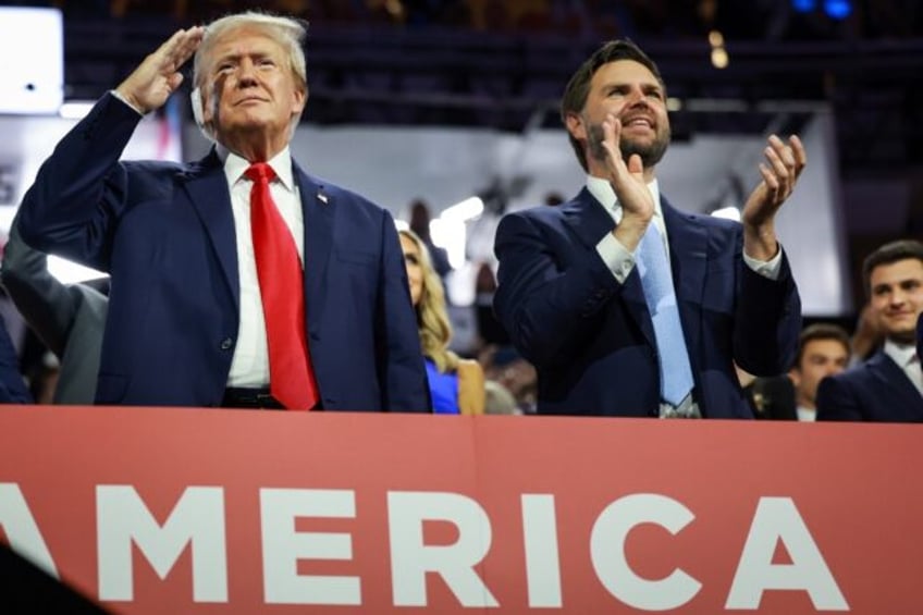 Republican presidential candidate Donald Trump (L) and his running mate J.D. Vance on the