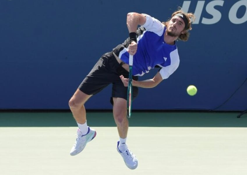 Struggling: Greece's Stefanos Tsitsipas falls to Thanasi Kokkinakis in the US Open first r