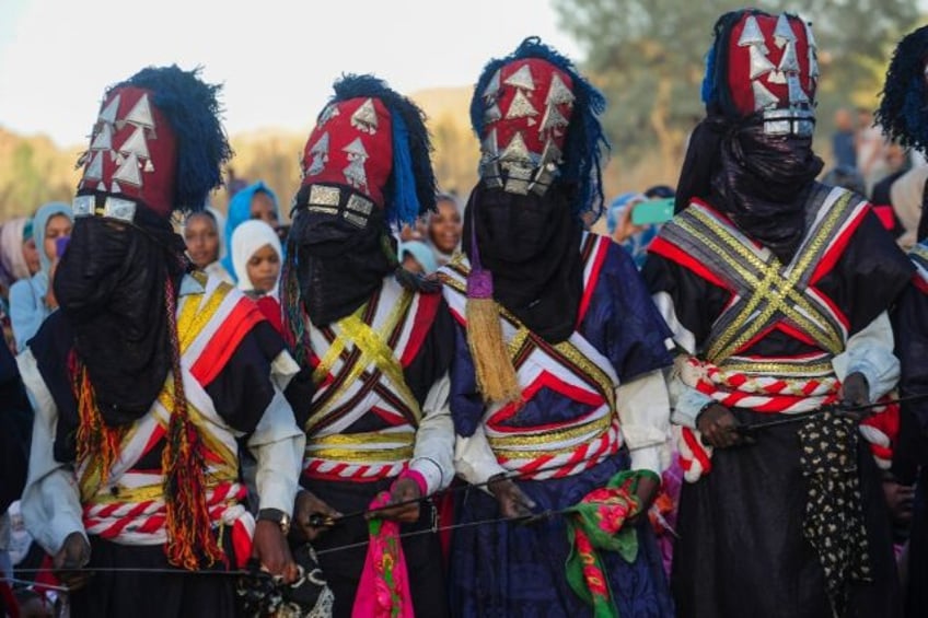 tuareg flock to algerian desert oasis for ancient festival