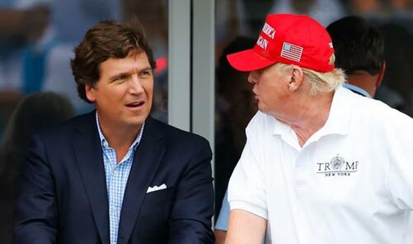 tucker and trump team up to upstage foxs gop debate