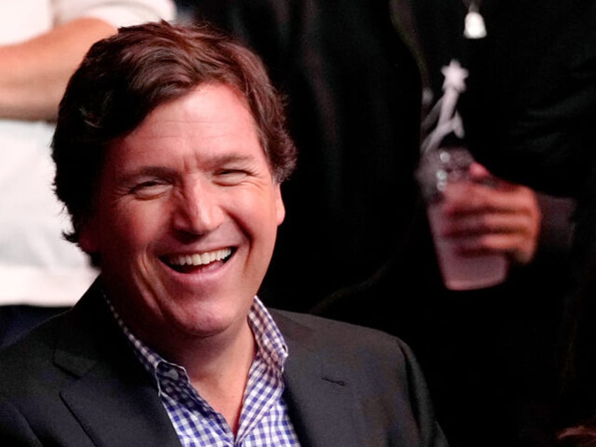 Tucker Carlson, Jeff Bottari/Zuffa LLC via Getty Images.