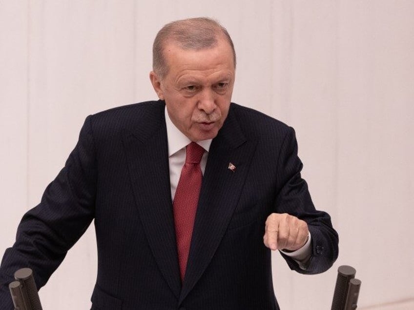 Turkish President Recep Tayyip Erdogan addresses the parliament to mark the opening of the