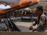 Turkey's Outlawed PKK Begins 'Symbolic' Disarmament By Burning Weapons