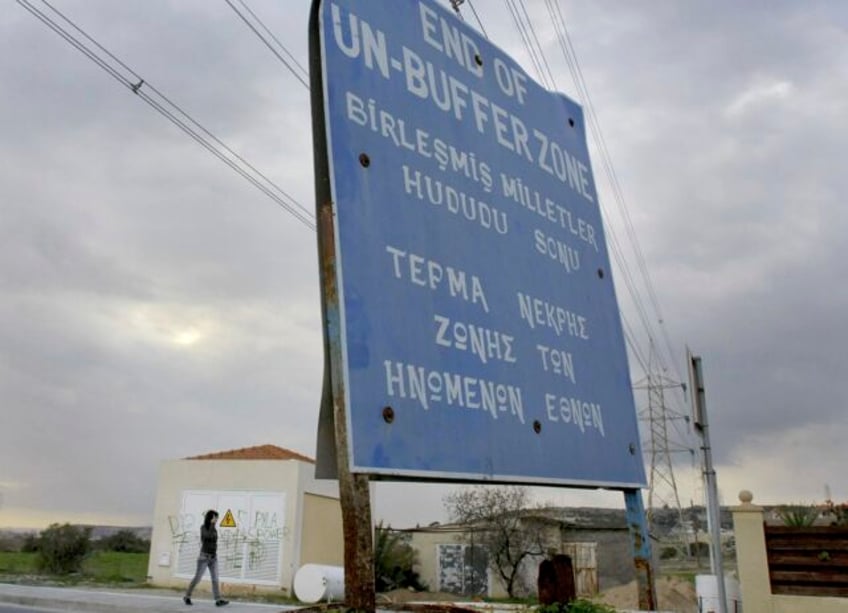 turkish cypriots attack un peacekeepers trying to halt road work inside divided cyprus buffer zone