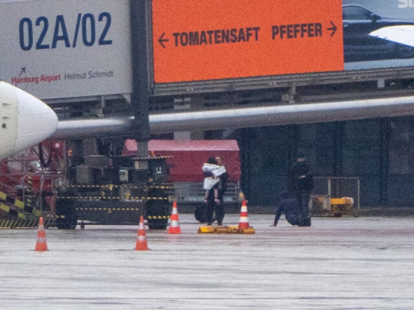 turkish speaking man arrested after 18 hour armed hostage standoff at hamburg airport