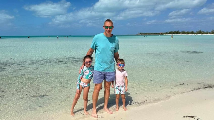 Bryan Hagerich poses with his children